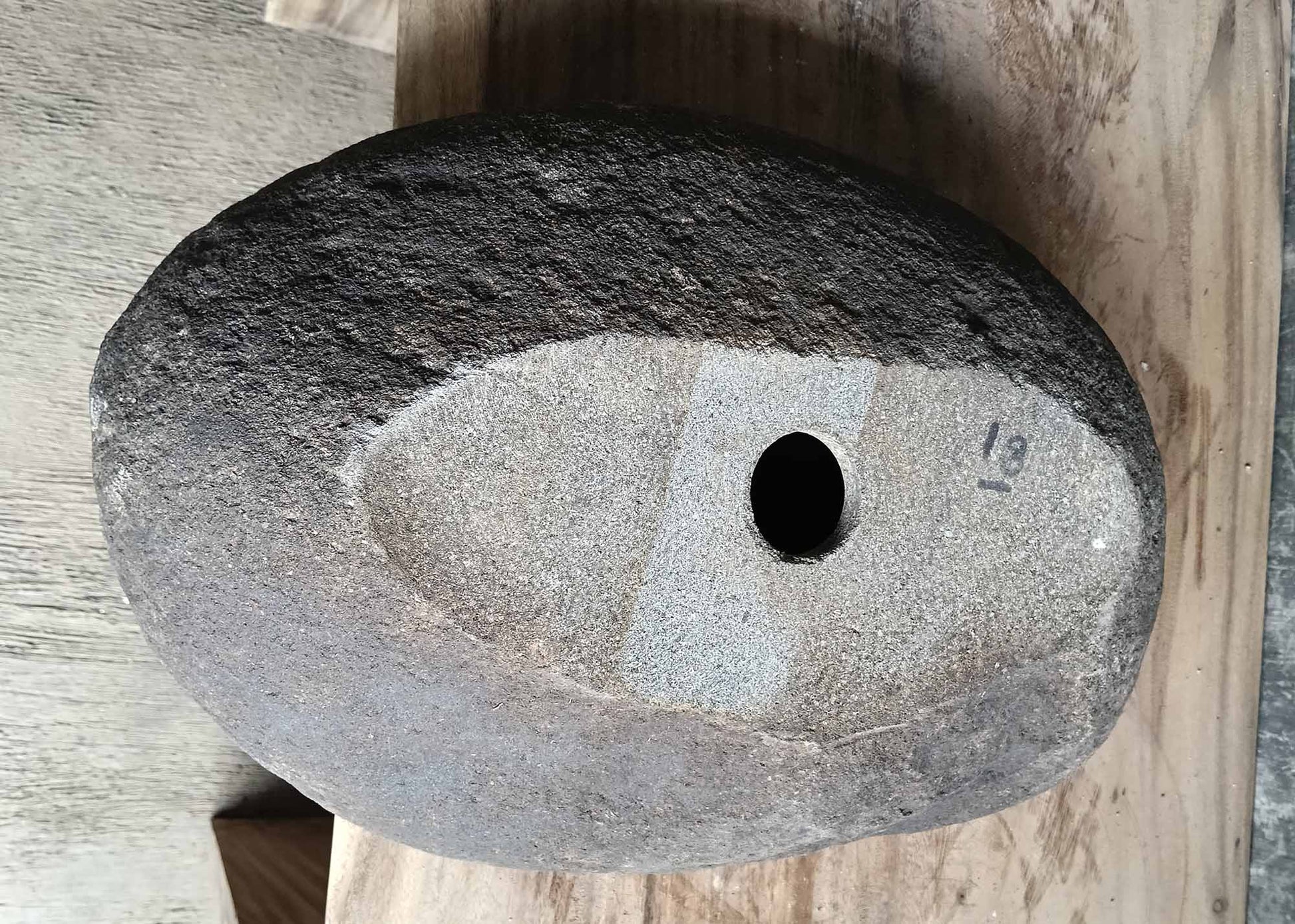 Left side angle of dark gray oval sink 6018-4732 with organic contours
