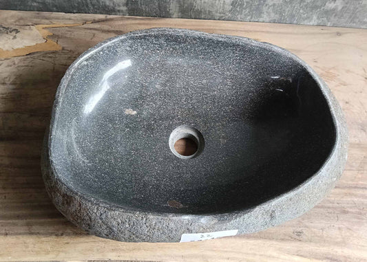 Top view of oval river stone sink 6022-4935 with dark gray polished surface
