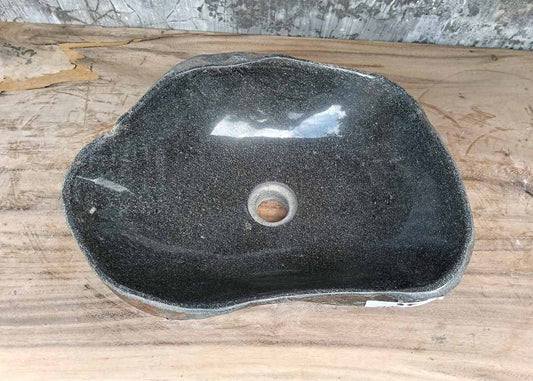 Top view of irregular river stone sink 6035-4234 with dark gray polished interior
