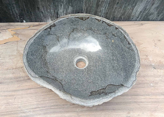 Top view of irregular river stone sink 6036-4237 with polished gray interior and dark natural veins
