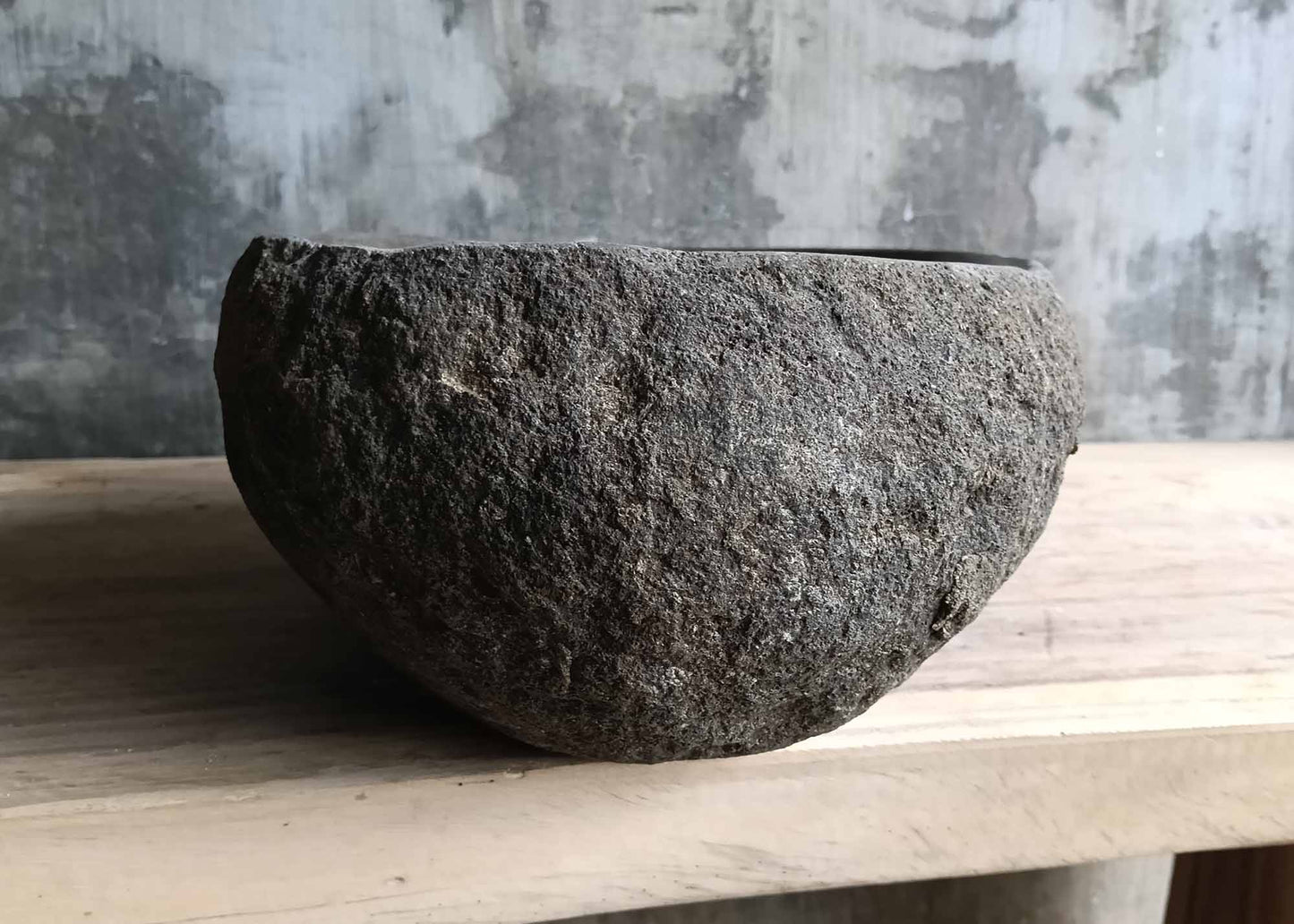 Backside of river stone sink 6039-4732 with natural rugged stone exterior

