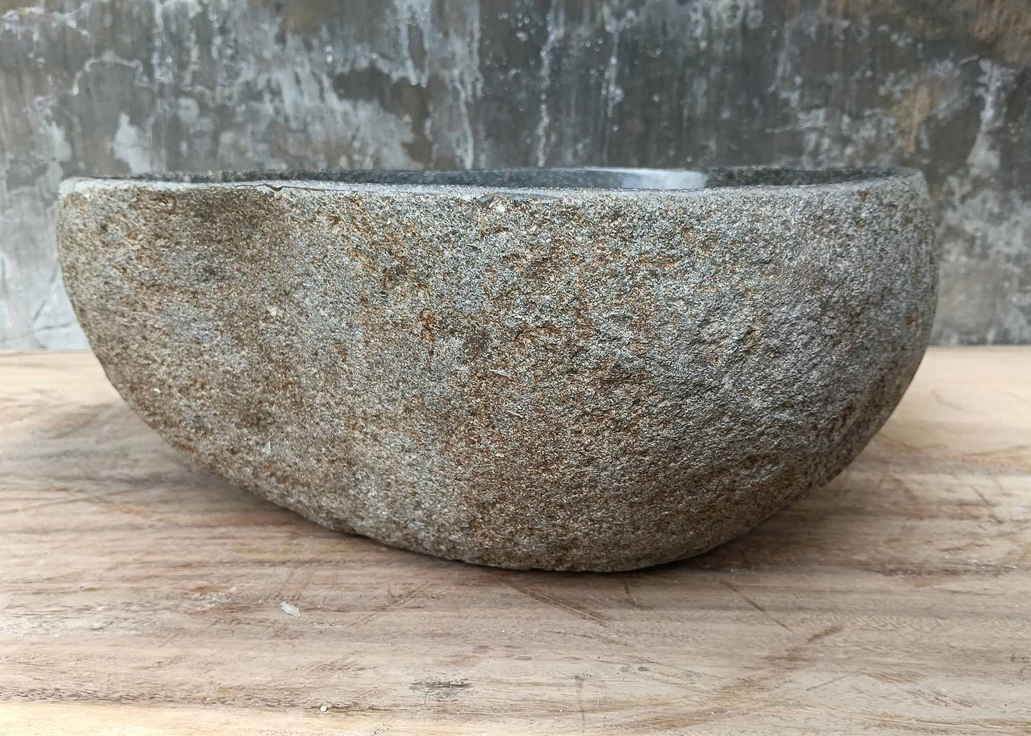 Right side of river stone sink 6042-3834 with rustic natural outer shell

