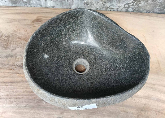 Top view of triangular river stone sink 6042-3834 with light gray polished interior

