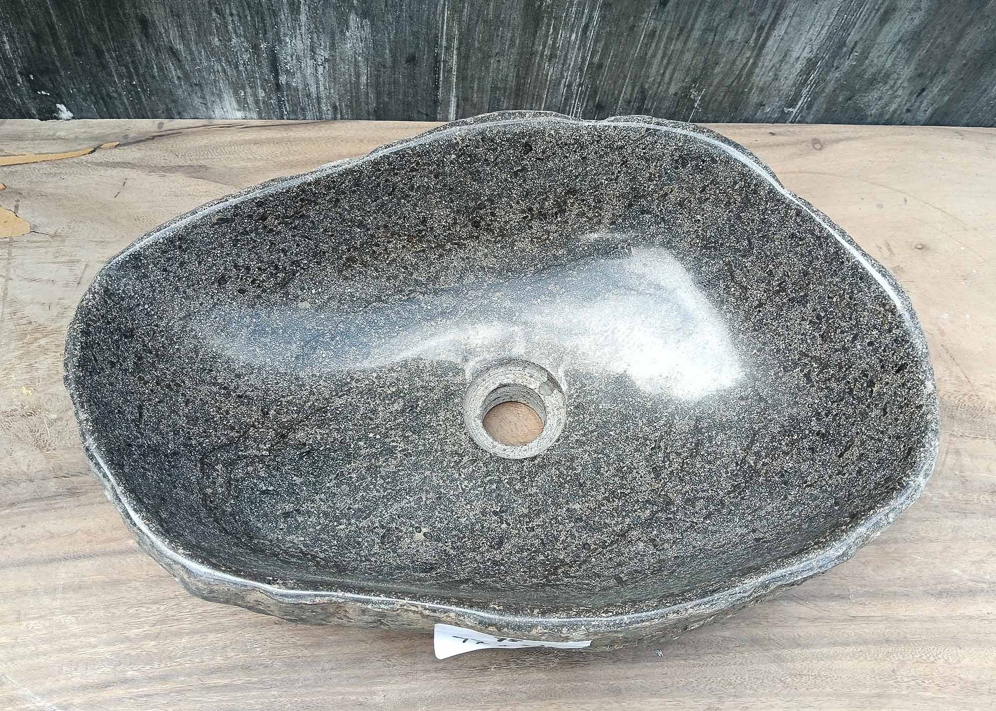 Top view of irregular river stone sink 6075-4733 with dark gray polished interior

