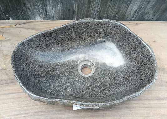 Top view of irregular river stone sink 6075-4733 with dark gray polished interior
