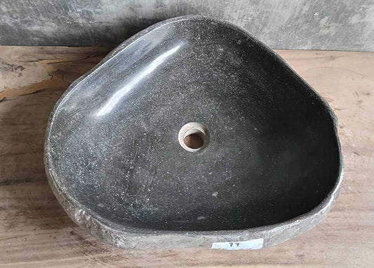 Top view of handcrafted triangular dark gray river stone sink SKU 6077-5044 with polished interior and rugged natural exterior
