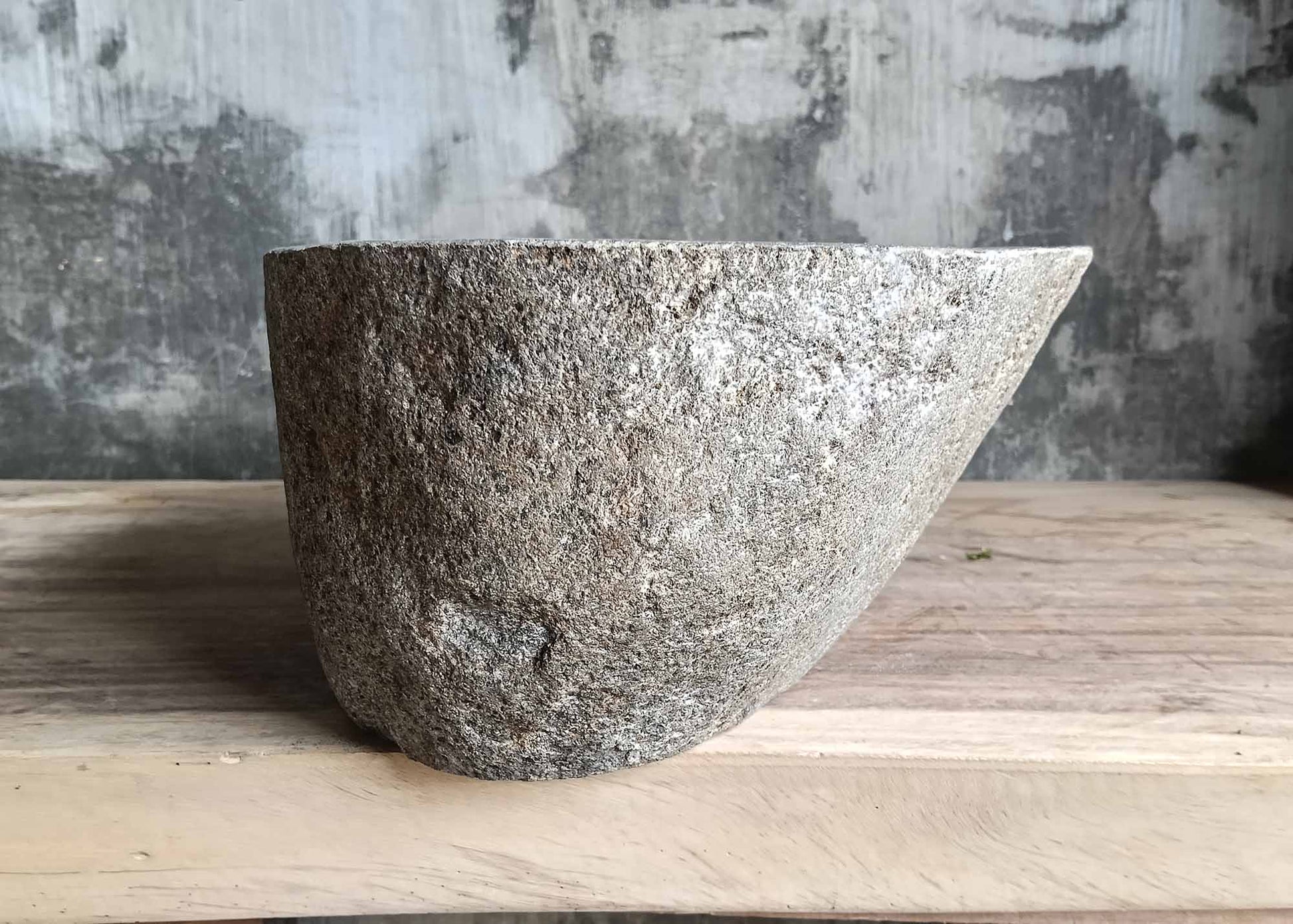 Backside of river stone sink 6080-4330 with textured natural exterior
