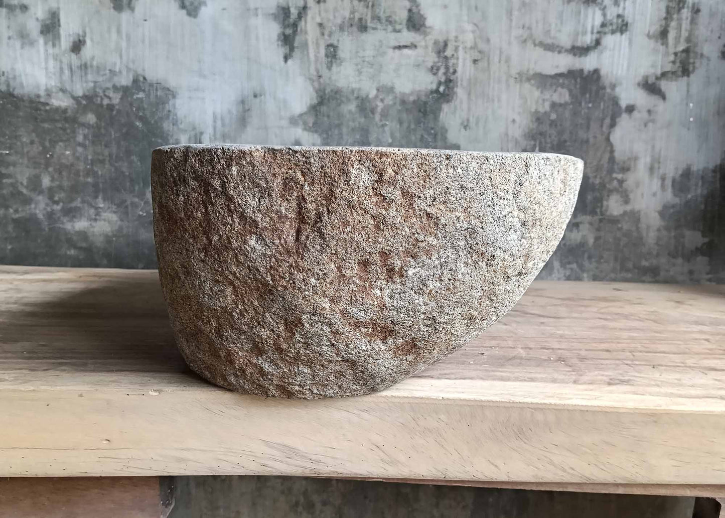 Right angle of river sink 6094-4931 highlighting curved organic profile
