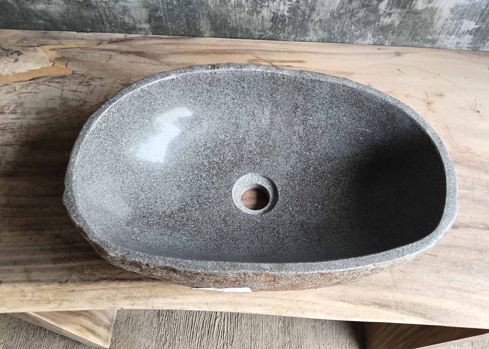 Top view of oval river stone sink 6094-4931 with light gray polished interior
