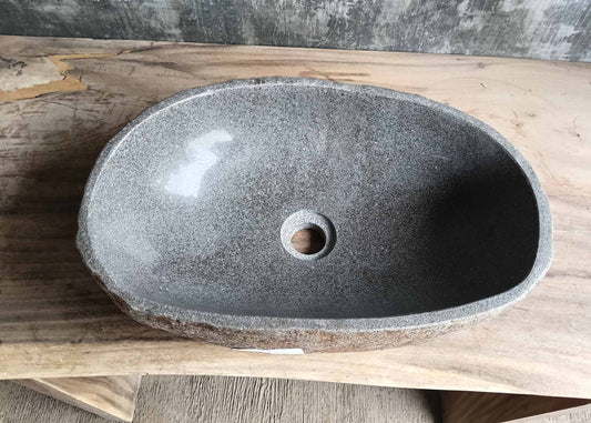 Top view of oval river stone sink 6094-4931 with light gray polished interior
