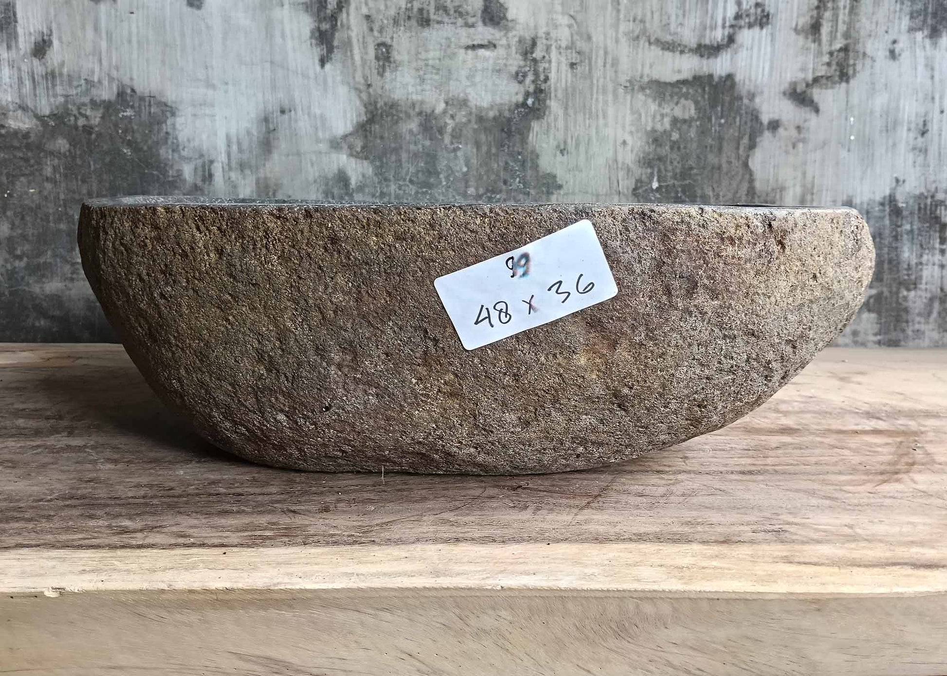 Front angle of handcrafted stone sink 6099-4836 showing natural contours
