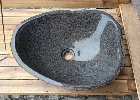Top view of oval river stone sink 6099-4836 with dark gray polished interior
