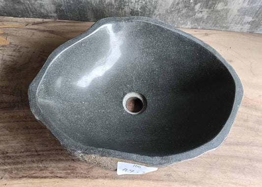 Top view of triangular river stone sink 6100-4738 with dark polished interior
