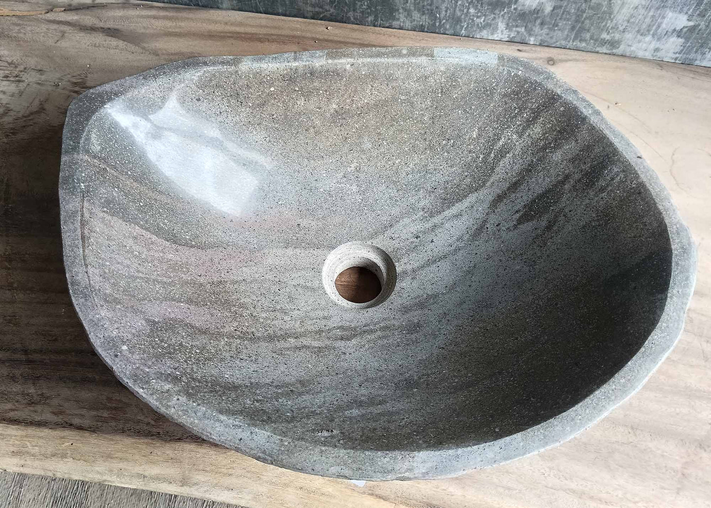 Top view of oval river stone sink 6102-4935 with light gray polished finish

