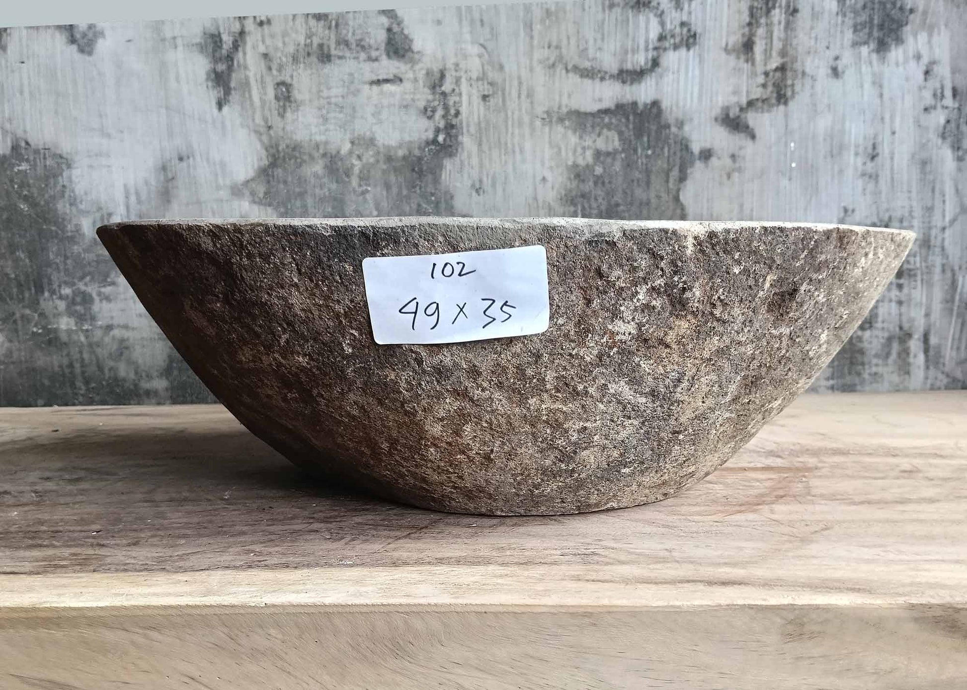 Front side of handcrafted river sink 6102-4935 with flowing gray tones
