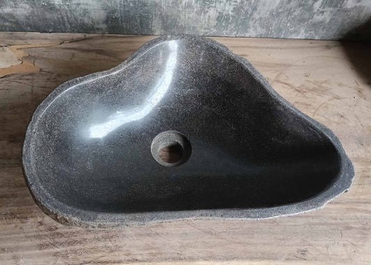 Top view of triangular stone sink 6118-4533 with smooth dark gray surface
