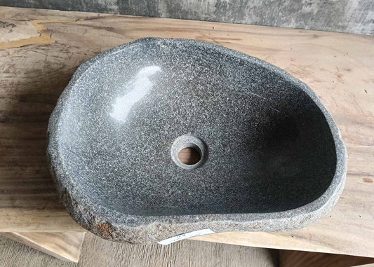 Top view of oval river stone sink 6119-4634 with dark gray polished interior
