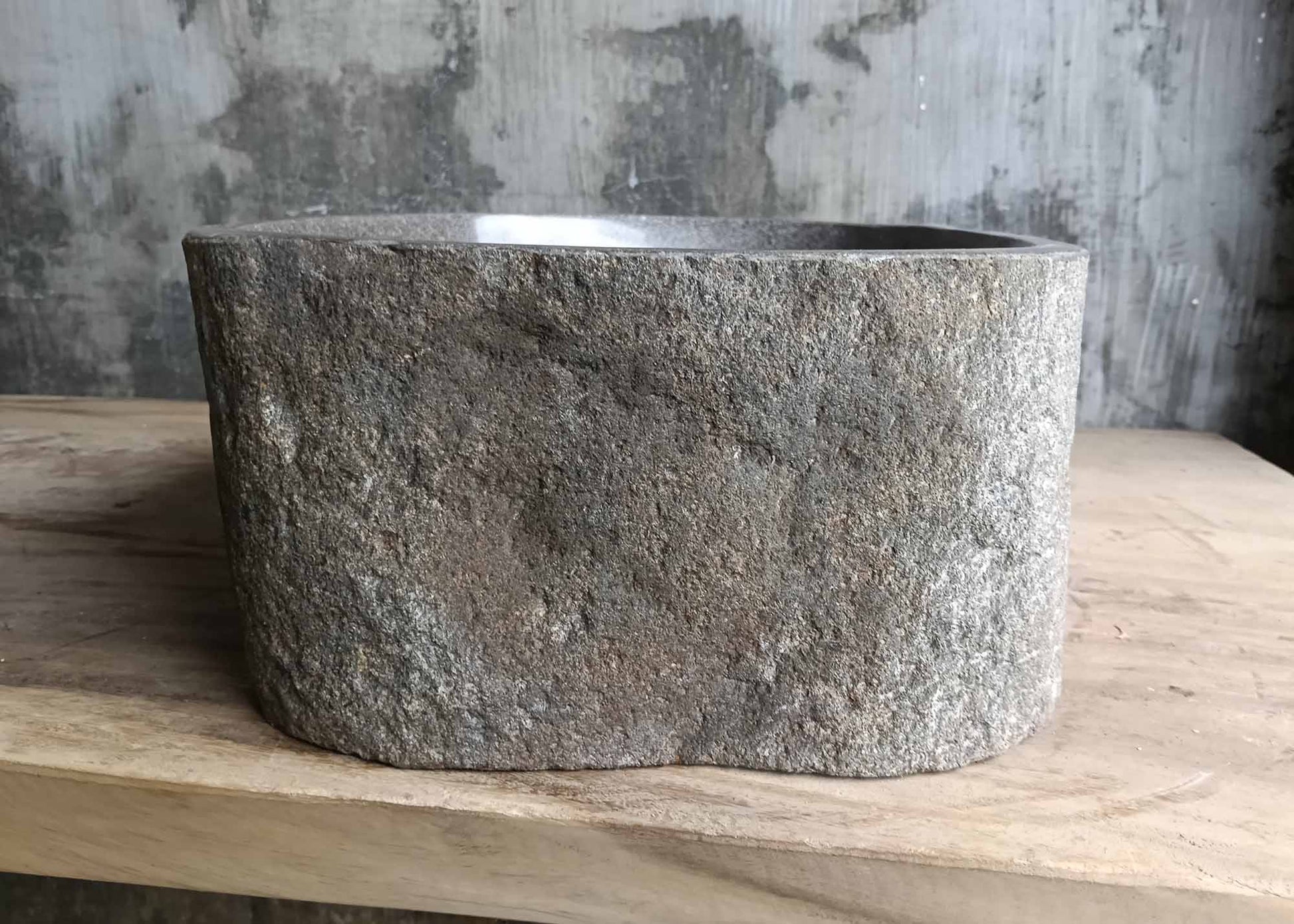 Left angle of river stone sink 6124-3730 highlighting polished interior curve
