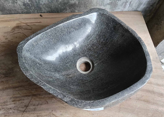 Top view of triangular river stone sink 6132-4132 with dark gray polished bowl
