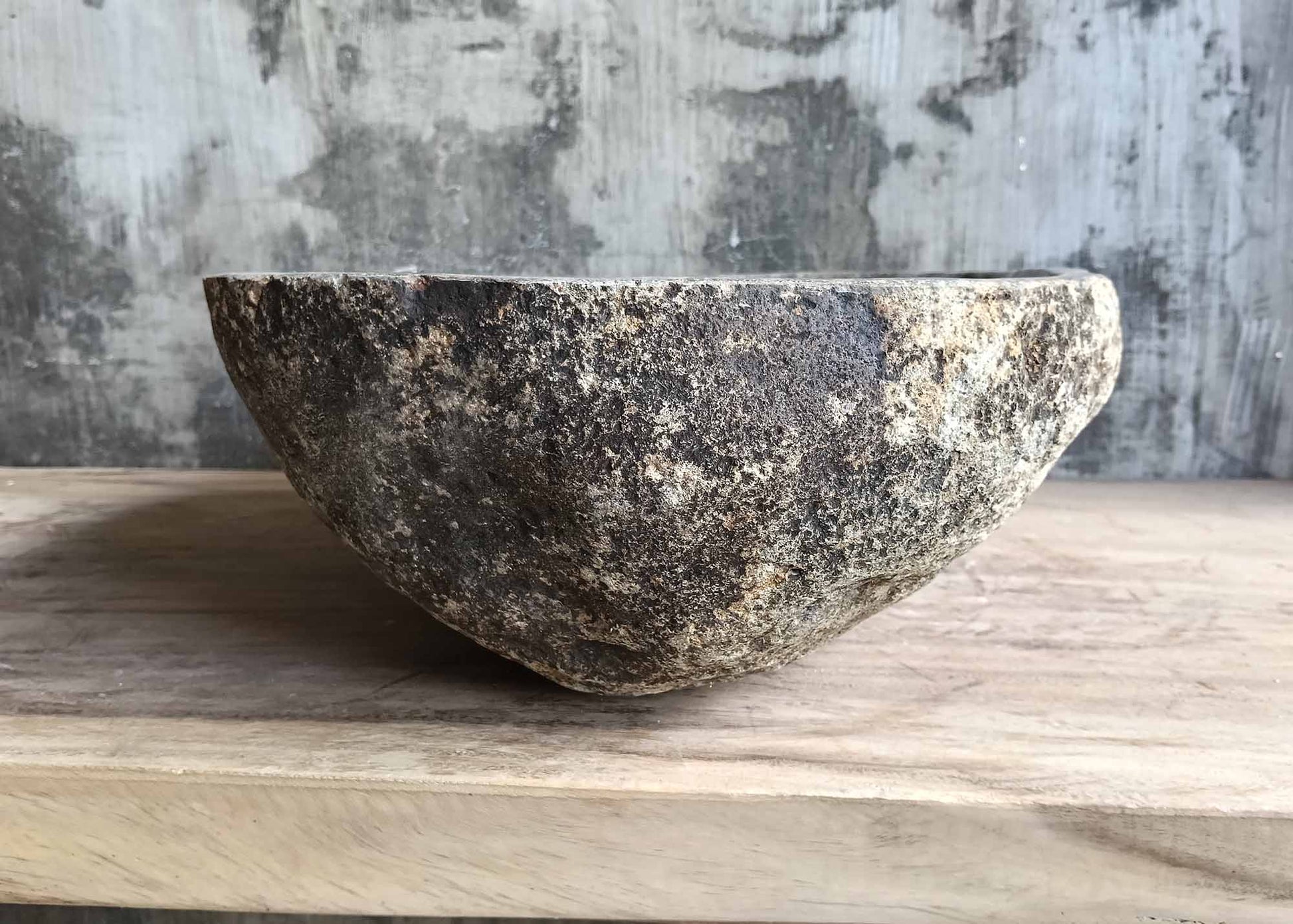 Right side view of stone basin 6133-4538 with soft oval curve
