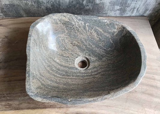 Top view of oval river stone sink 6133-4538 with swirling gray-beige interior
