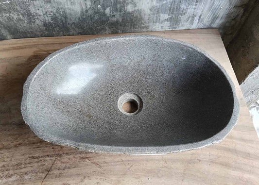 Top view of river stone sink 6137-4831 with dark gray oval basin
