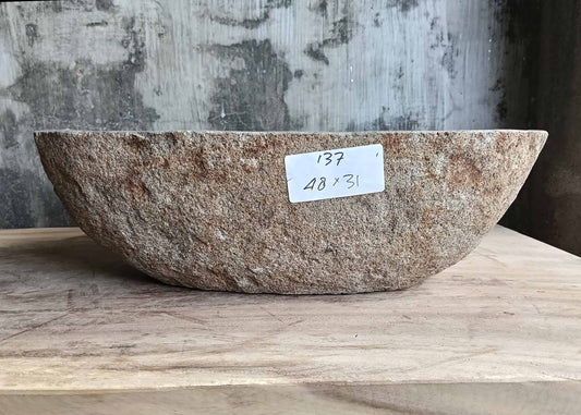 Front view of handcrafted stone sink 6137-4831 showing smooth interior
