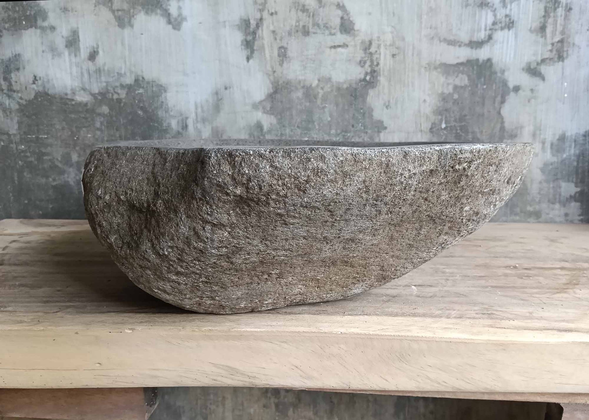 Left side view of river stone sink SKU 6148-5247 featuring natural stone texture and irregular shape
