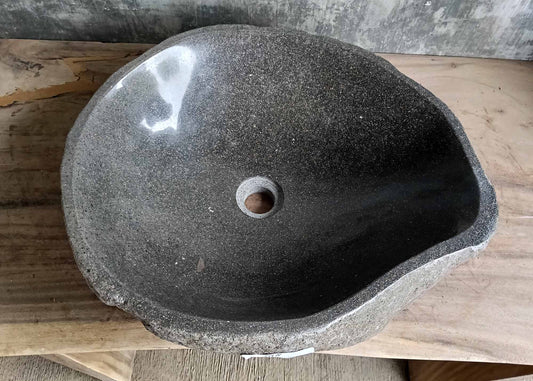 Top view of river stone sink SKU 6148-5247 with polished dark granite interior and natural uneven edges
