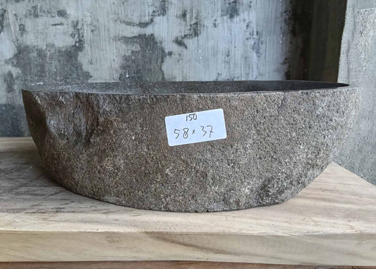 Front view of handcrafted river stone sink SKU 6150-5837 showing natural textured granite surface
