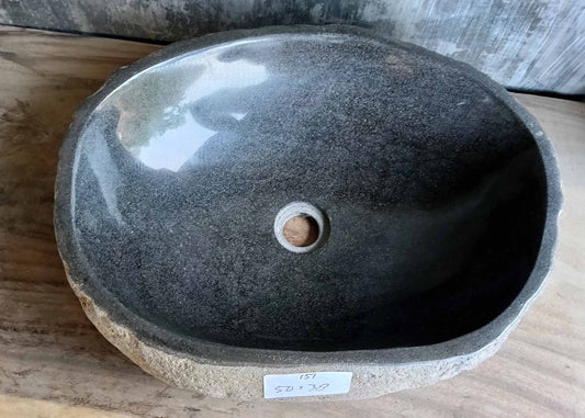 Top view of river stone sink SKU 6151-5038 with polished dark interior and oval organic shape

