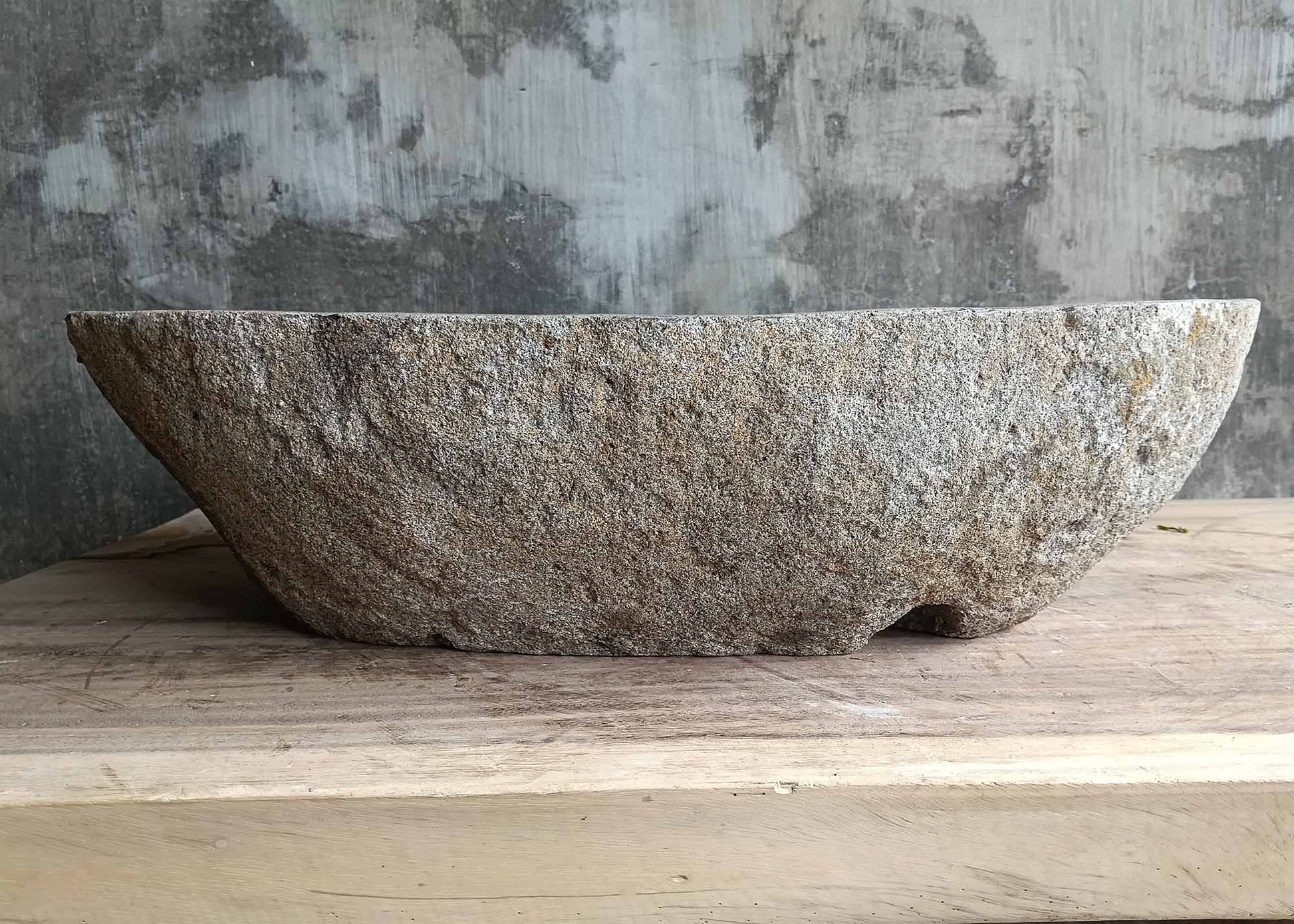 Rear view of river stone sink SKU 6155-5836 with natural stone texture and elongated body
