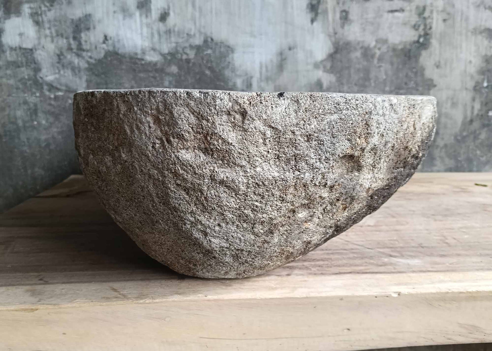 Left side of river stone sink SKU 6155-5836 showing rugged surface and smoothed basin edge
