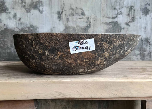 Front view of handcrafted sink SKU 6160-5141 showing rugged brown-black natural granite exterior
