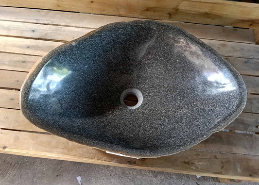Top view of river stone sink SKU 6170-5437 with triangular shape and polished dark granite interior
