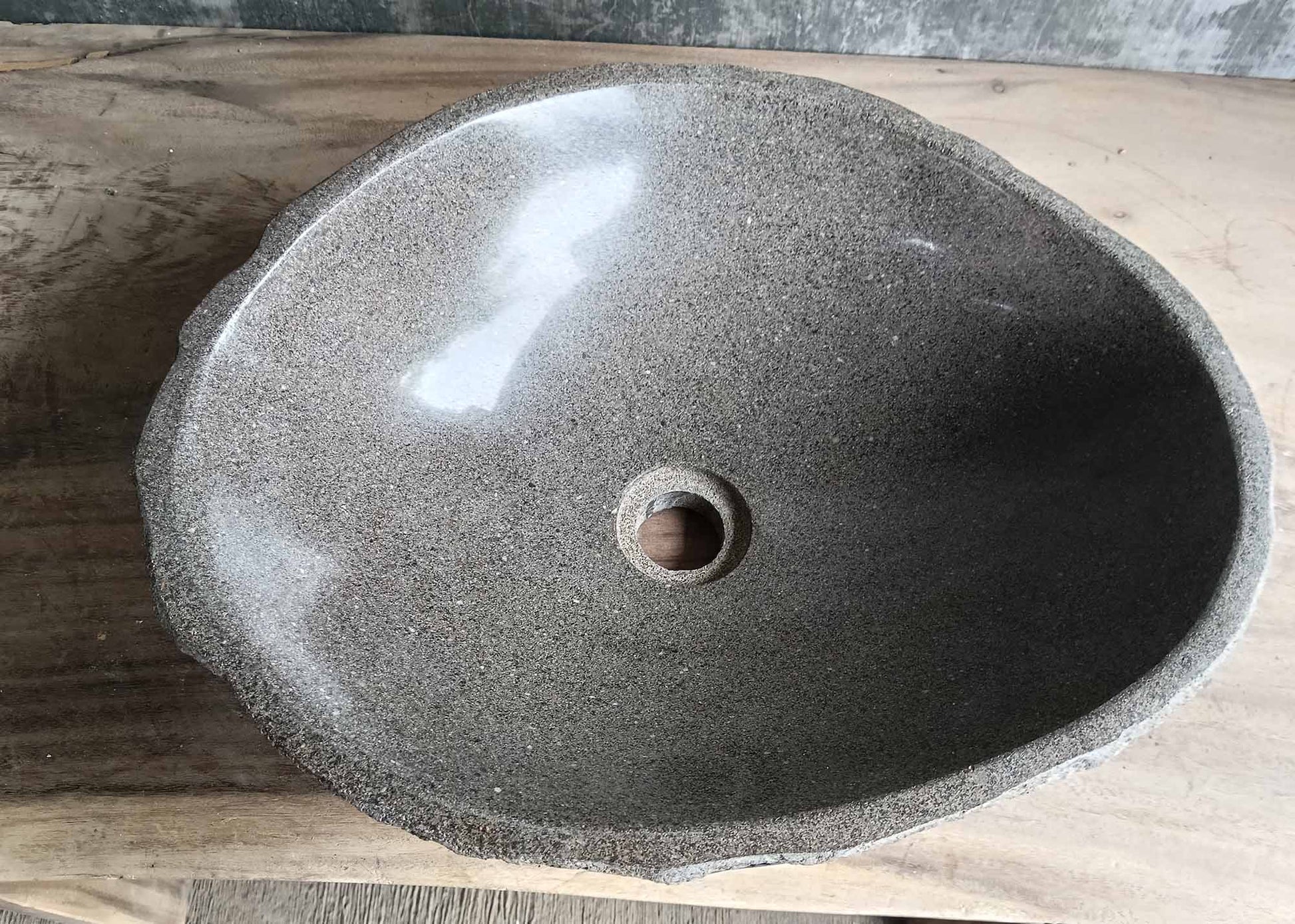 Top view of dark gray river stone sink with polished oval bowl – SKU 6174-4637
