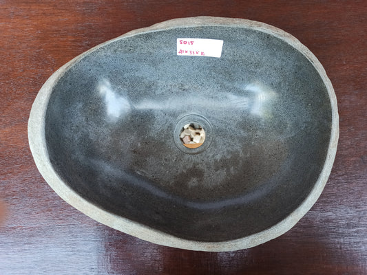 Top view of 5015-413316 charcoal gray river stone sink — polished elongated oval interior
