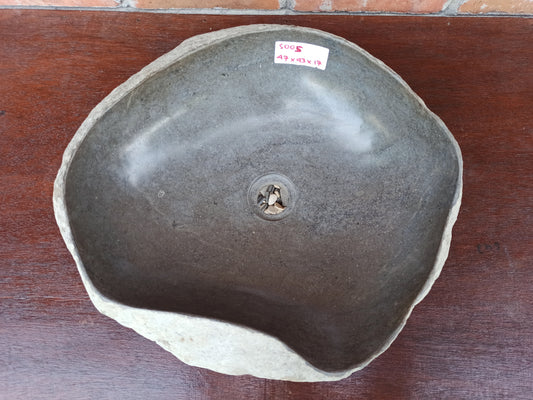 Top view of 5005-474317 graphite gray river stone sink — organic triangular shape, polished interior
