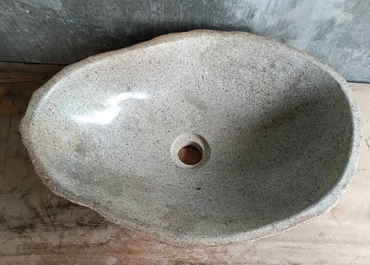 Top view of 18×13 inch light gray river stone sink with boat-like oval shape
