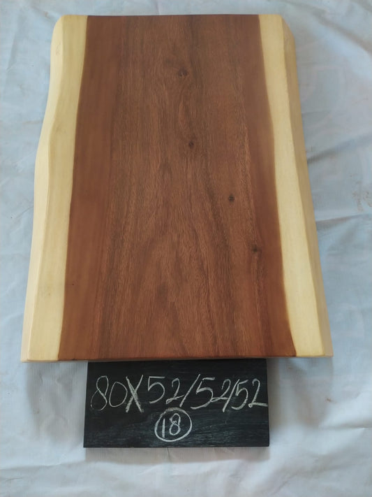 Top view of suar wood slab 0018-525252 with live edge shape and warm brown natural wood grain, solid single-piece countertop.
