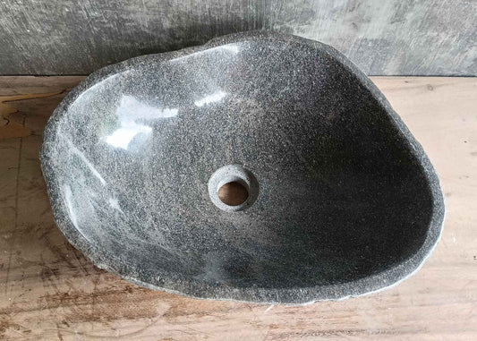 Top view of 17×13 inch handcrafted gray river stone sink with irregular shape
