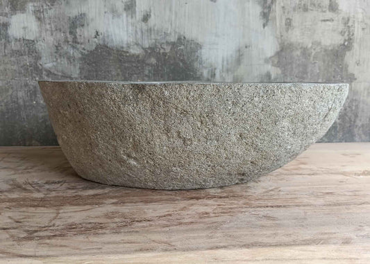 Front view of gray river stone sink 17×14 inch with tall cylindrical stone wall
