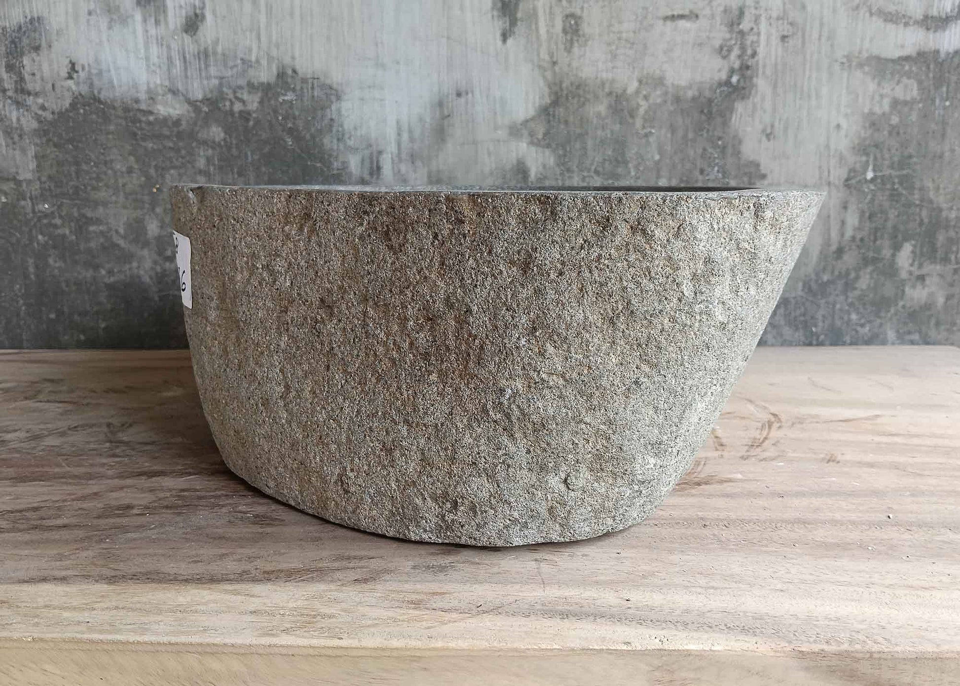 Right side view of 17×14 inch stone sink in gray with natural texture and straight side
