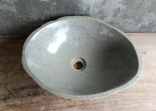 Top view of 17×14 inch light river stone sink with perfect oval shape and polished interior
