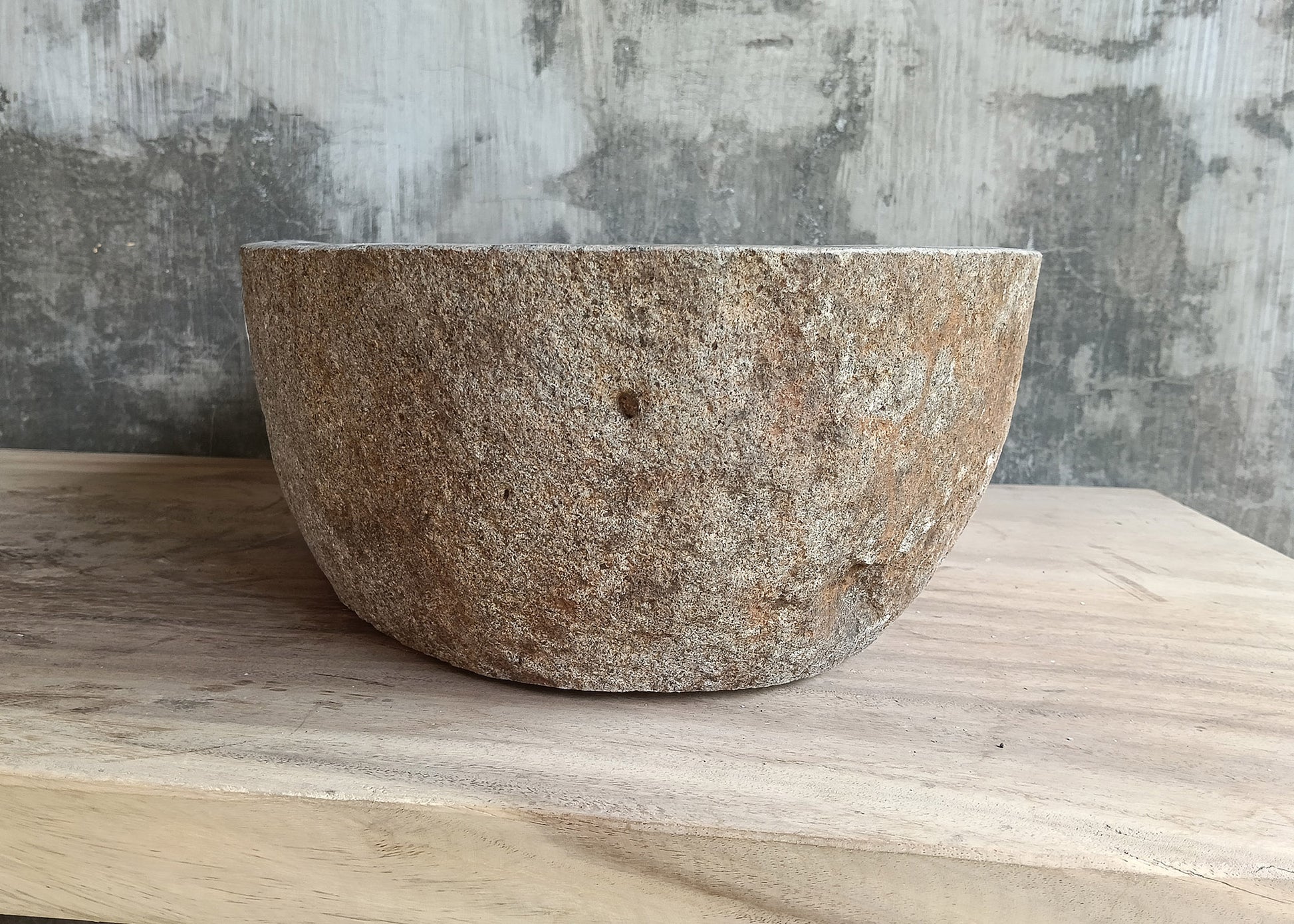 Right side of handcrafted gray 18×14 inch sink with unique asymmetrical outline
