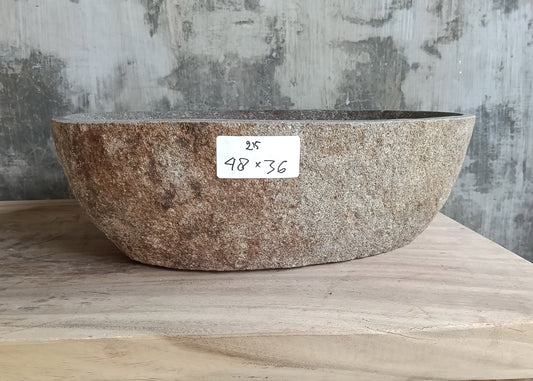 Front view of 18×14 inch handcrafted gray river stone sink with angular contours and raw finish
