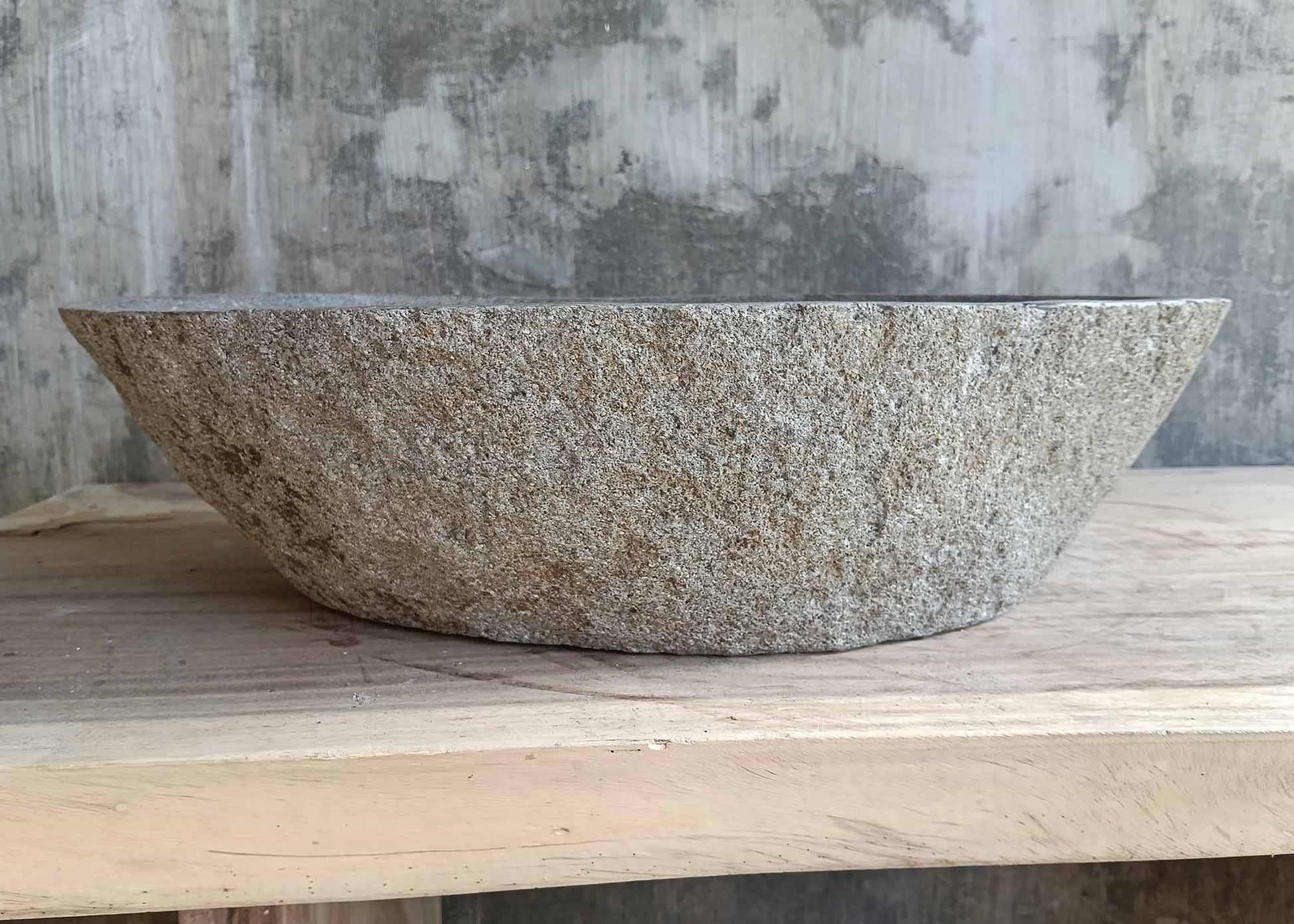 Rear view of river sink SKU 6218-5634 featuring raw natural surface and wide oval back
