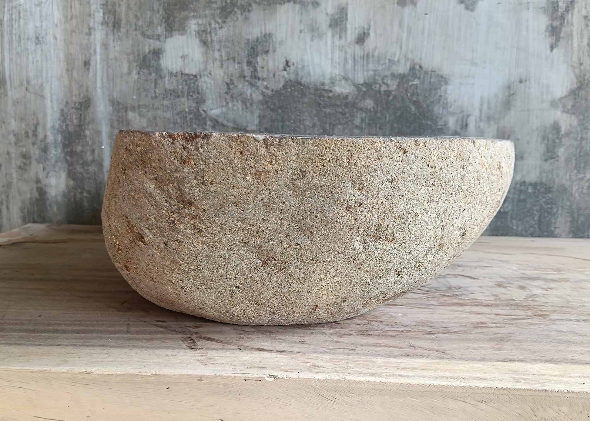 Side profile of river stone sink 6219-5538 with gentle slope and rough natural edge
