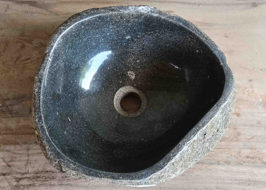 Top view of handcrafted grey-brown 13×13 inch river stone sink in oval form
