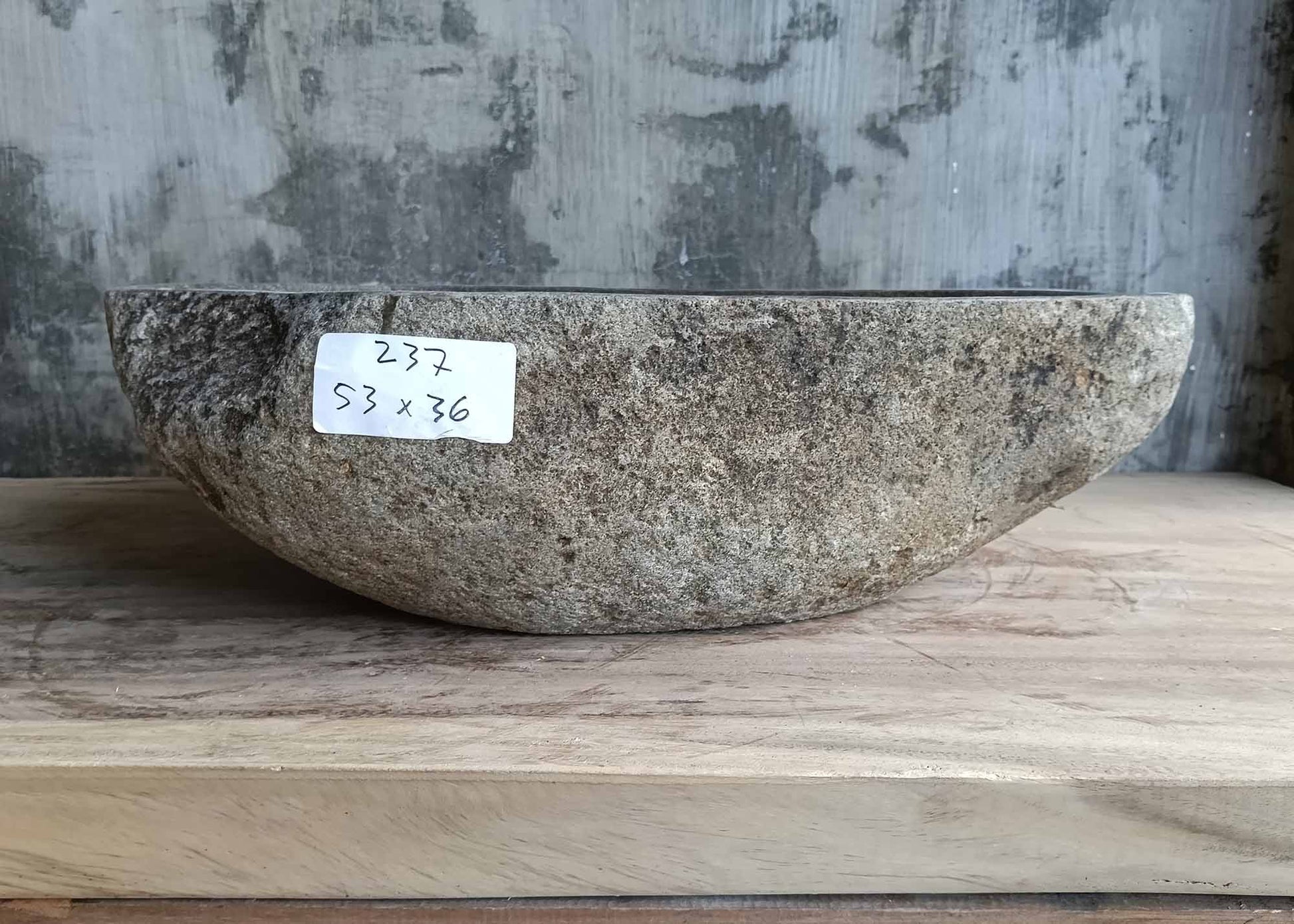 Front angle of handcrafted sink 6237-5336 showing earthy raw texture and asymmetrical lines
